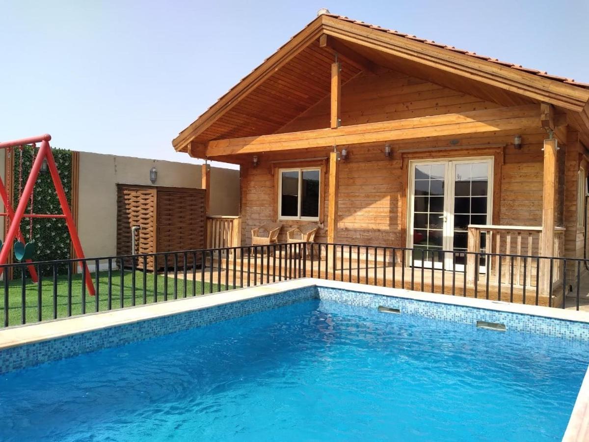 Villa شاليهات الكوخ السويسري وأكوابارك à Ash Shishah Extérieur photo